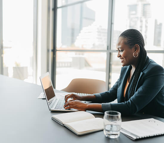 businesswoman with laptop in meeting room
