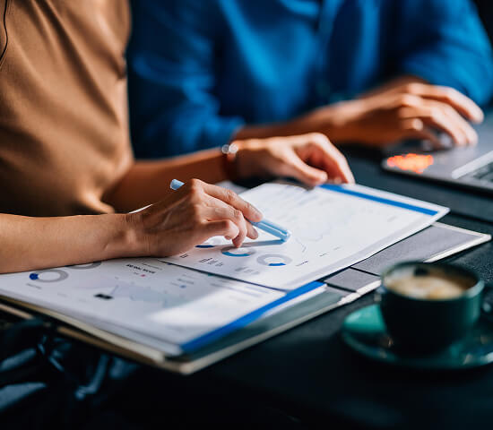 people looking at charts 